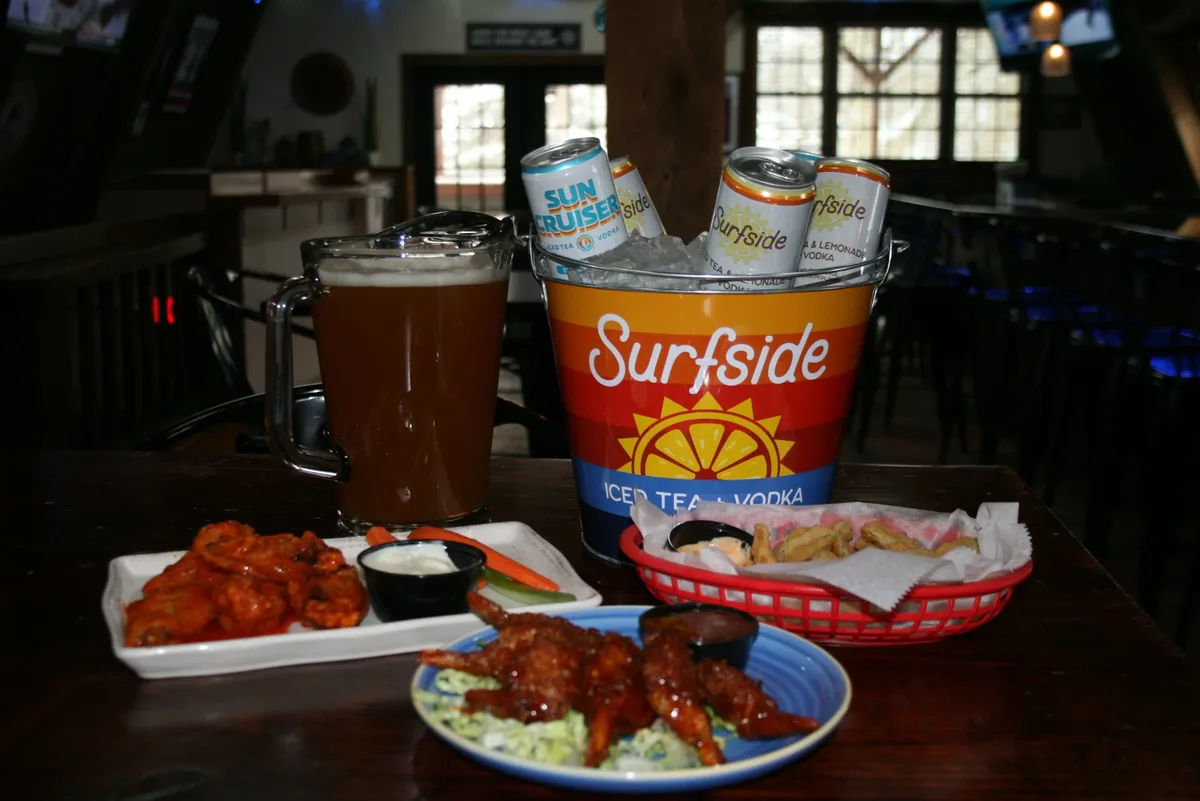 Captain's Hideaway bar with wings and Surfside drinks